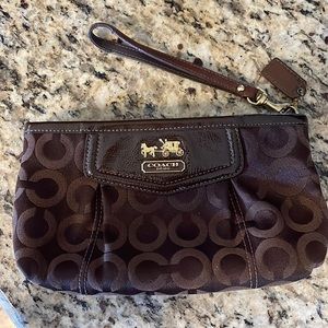 Coach brown colored wristlet